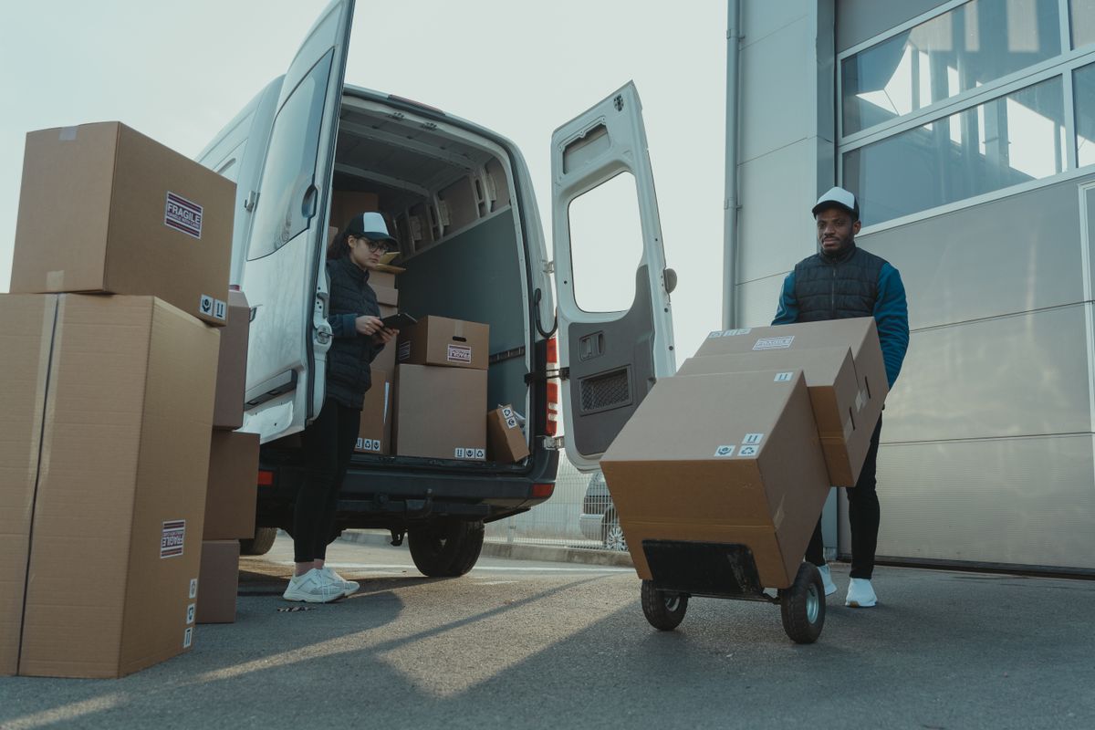 Loading cartons into a delivery van